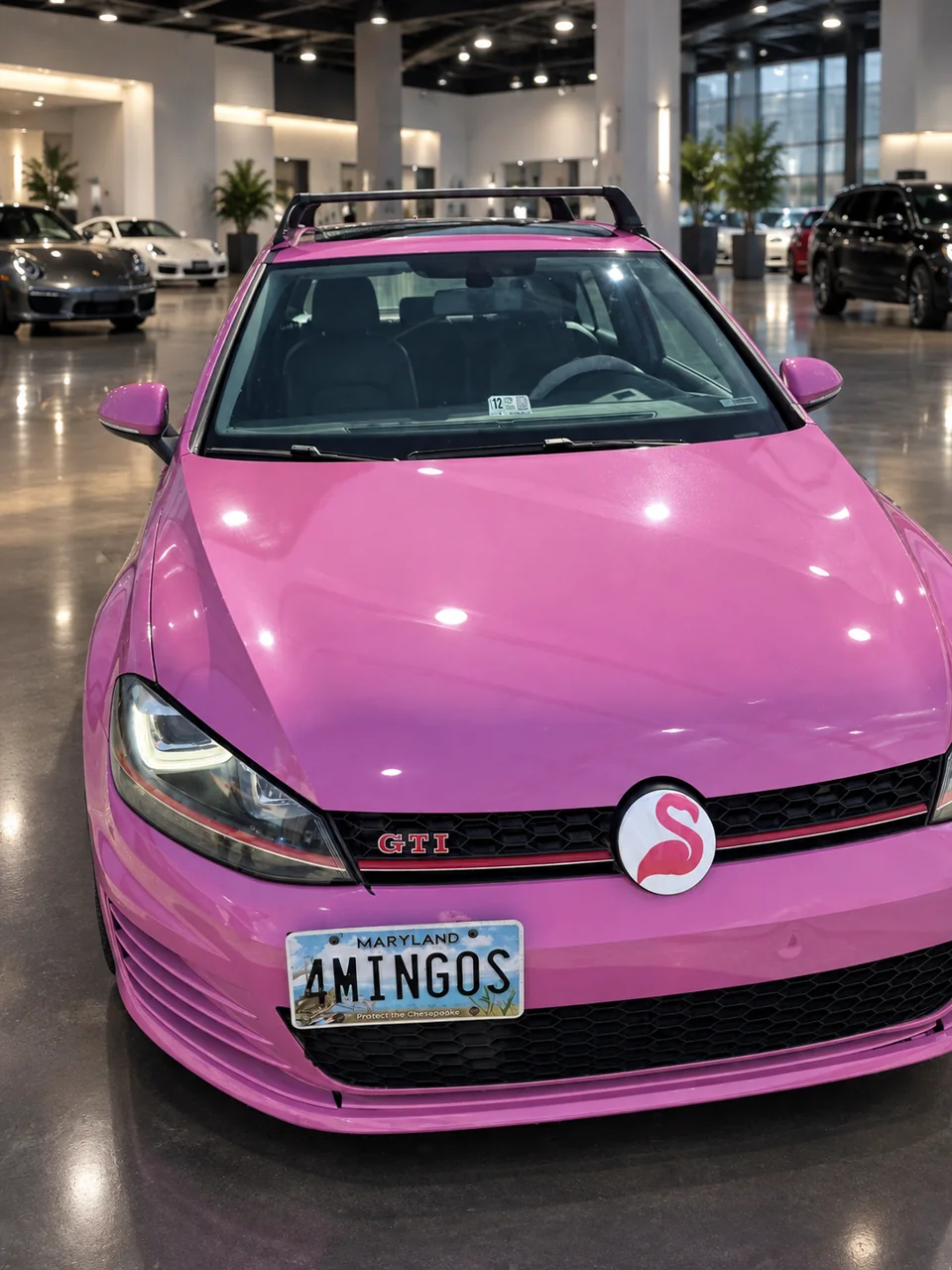 Yong’s Interstellar Pink GTI in a showroom background composite